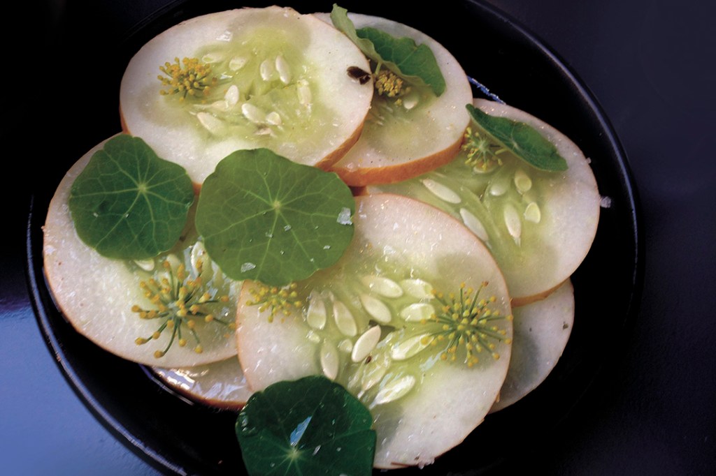 Poached cucumber with kumbu, dill, and flowers. Photo by Nicole Sprinkle