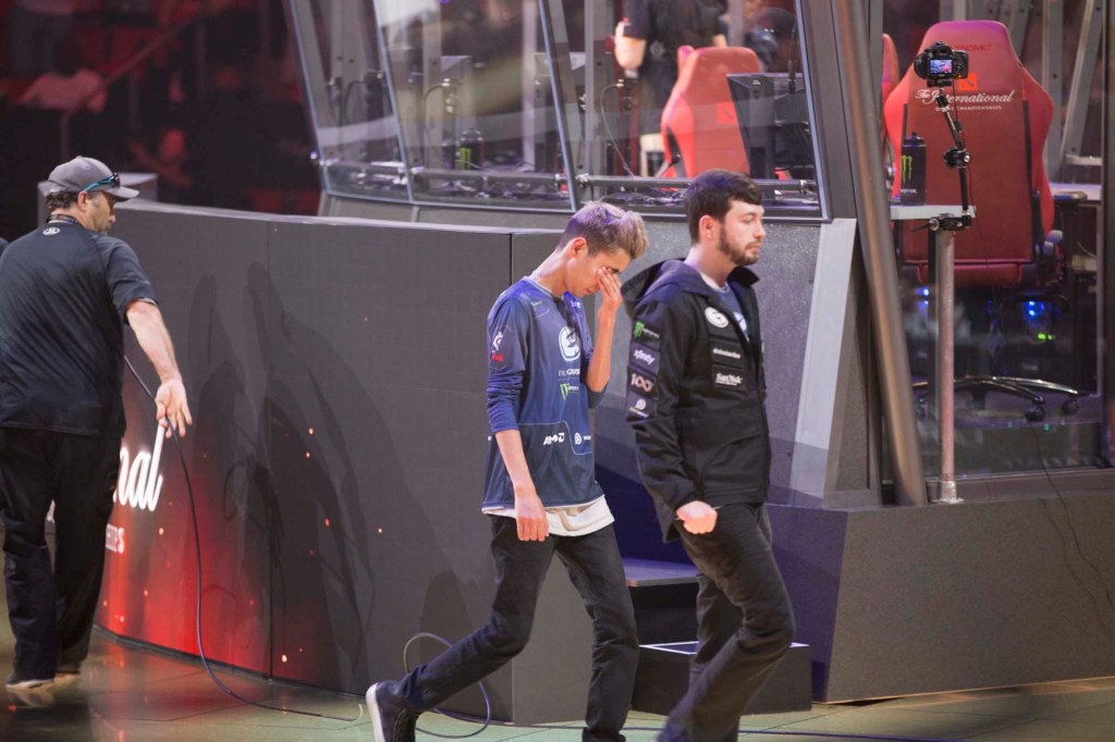 Syed Sumail &ldquo;SumaiL&rdquo; Hassan, from Pakistan, rubs his eyes after his team came in third place and won a prize of $2,180,726.