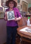 Mary Lou Slaughter, with a photo of William DeShaw. Photo by David Lewis