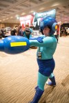 Lily Martinez from Burien wears their Mega Man costume in the exhibit hall. Lily has been attending PAX since 2008.