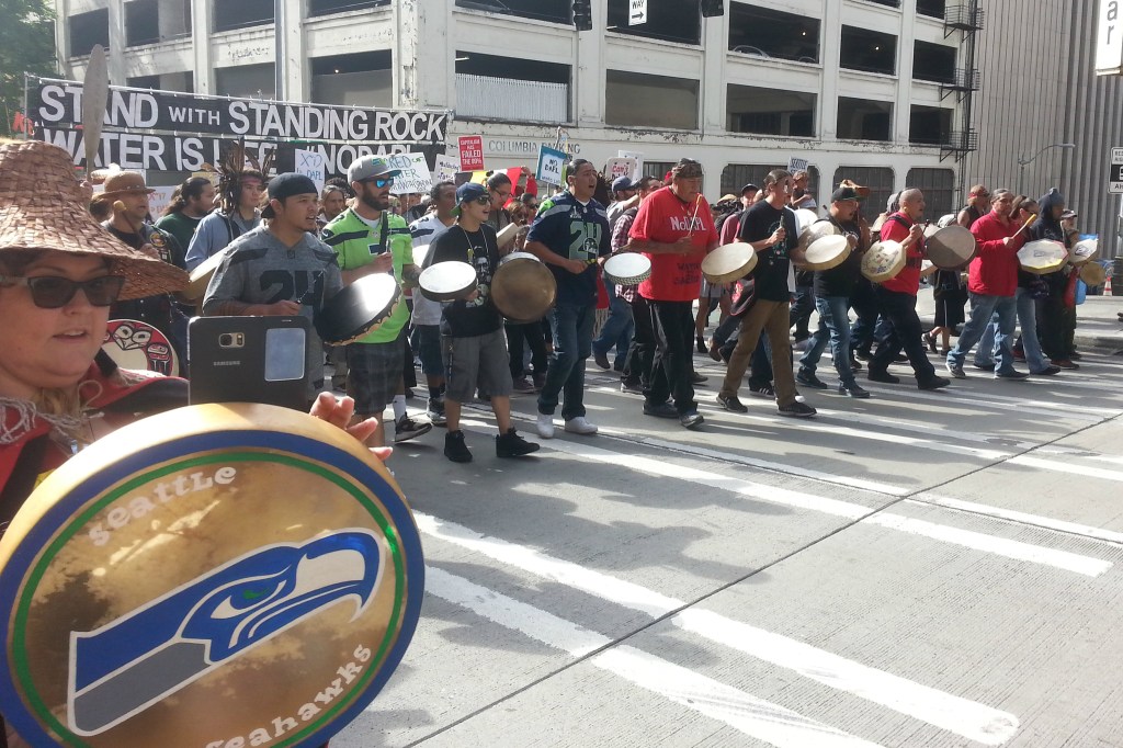 Native protesters march through downtown Seattle against the North Dakota Access Pipeline. Photo by Casey Jaywork.