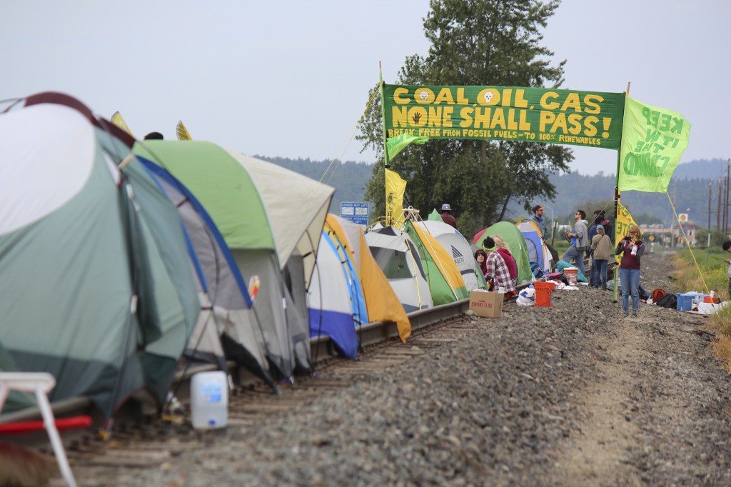 Protesters on the oil train tracks in Anacortes in May 2016. Photo by Sara Bernard.