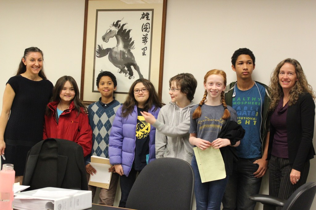 Plaintiffs celeberate a temporary win at a hearing in November 2015. Photo by Sara Bernard.