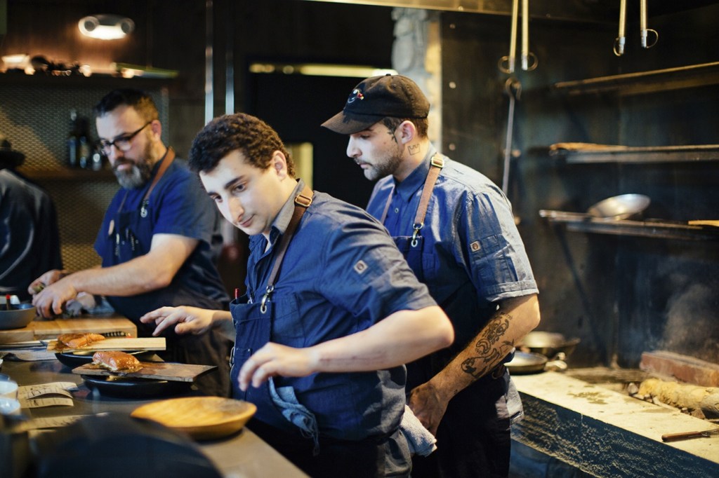 Josh Henderson, left, in the Vestal kitchen. Courtesy of Vestal