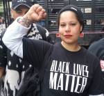 Nikkita Oliver at an immigrant rally. Photo by Casey Jaywork