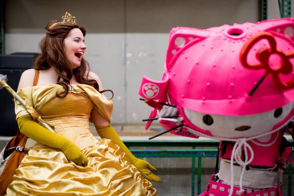 Belle gets a good look at Samurai Hello Kitty backstage during the annual costume/cosplay contest on Saturday night.