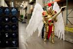 Jason Biser walks down a backstage alley as a male version Kayle from League of Legends.
