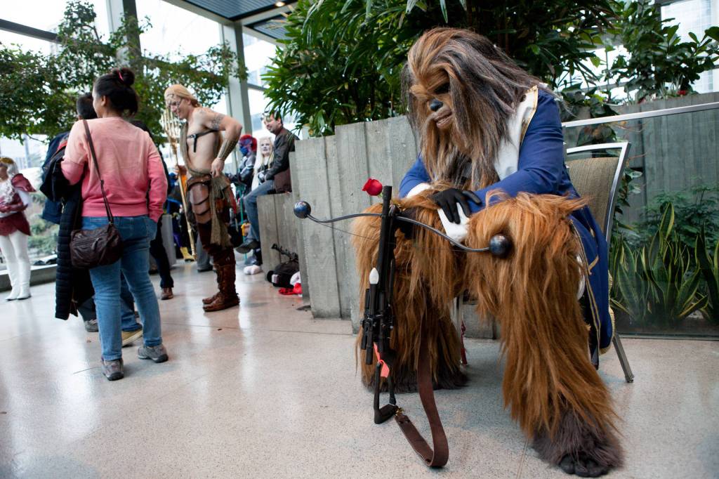 Eric Pope, dressed as a Chewbacca / Beauty & the Beast mash-up, takes a break Saturday afternoon. Photo by Jeremy Dwyer-Lindgren for Seattle Weekly