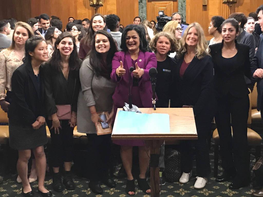 Rep. Pramila Jayapal celebrates the announcement of the College for All Act at a press conference in D.C. Photo courtesy Jayapal&rsquo;s office