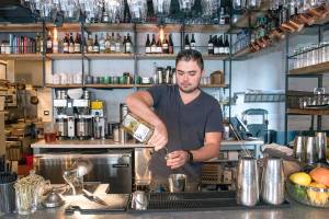 Casey Estrada making the house special, Eastern Medicine. Photo by Morgen Schuler