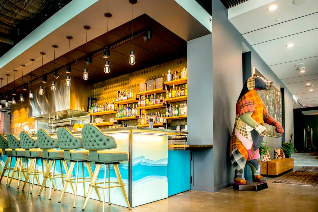 Scout&rsquo;s plaid bear speaks to the more overt designs appearing in dining rooms. Photo by Sarah Flotard/Scout