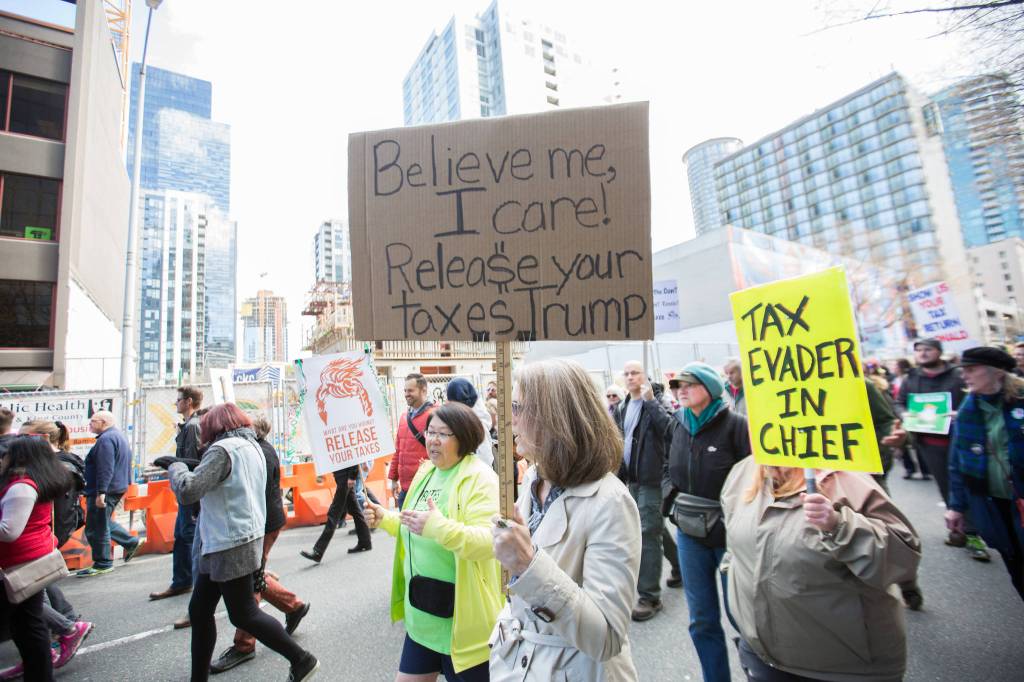 ‘We Care and We’re Aware’: More than 1,000 March Demanding Trump’s Tax Returns