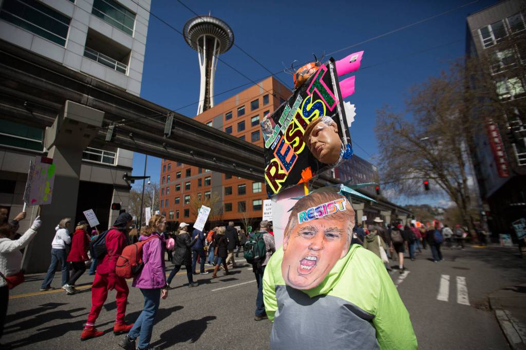 ‘We Care and We’re Aware’: More than 1,000 March Demanding Trump’s Tax Returns