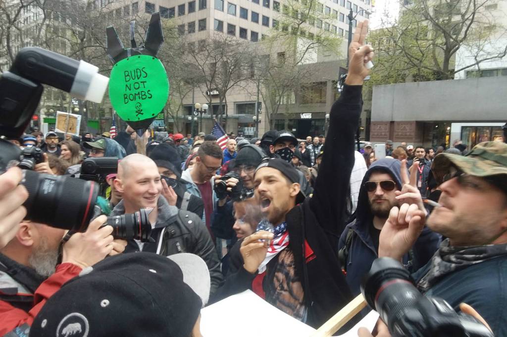 At one point, a group of men in the middle of the crowd at Westlake began rolling and smoking doobies and chanting &ldquo;USA! USA!&rdquo; Photo by Casey Jaywork