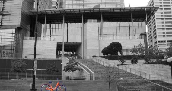 With the Pronto failure under its belt, City Hall will try to regulate a new breed of bikeshare. City Hall photo by Rootology, bike photo courtesy of Spin