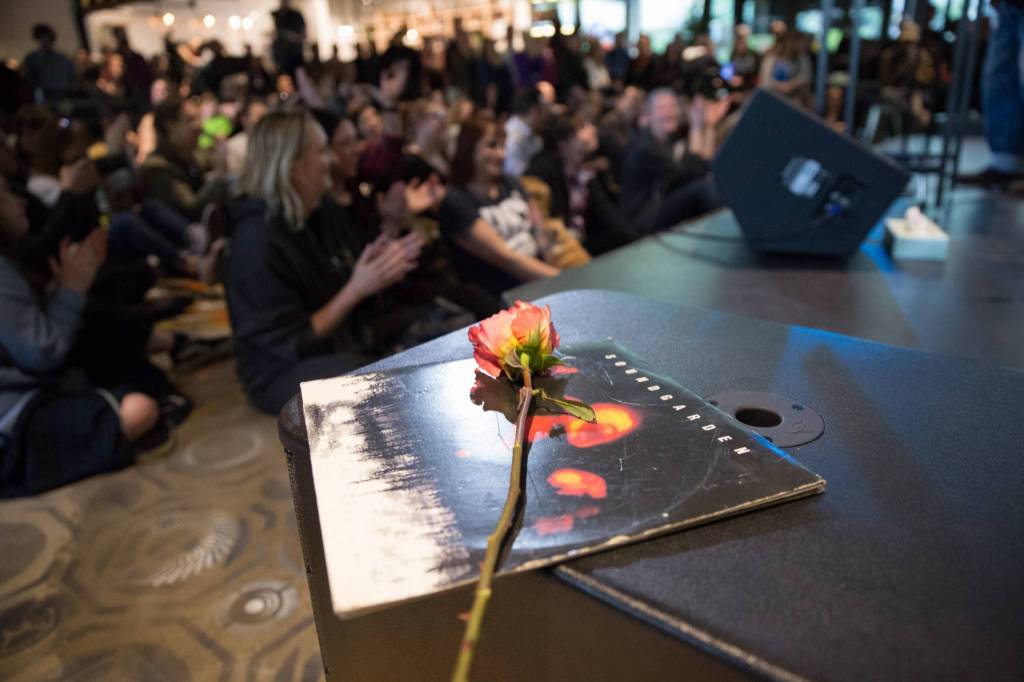 Soundgarden&rsquo;s &lsquo;Superunknown&rsquo; album sits beneath a rose on top of a speaker at the KEXP memorial for Chris Cornell. Photography by Alex Garland