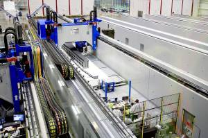 The gantry system is tested at the new 777x Composite Wing Center at Paine Field in Everett last year. Tax breaks enticed the Boeing Co. to locate the 777X assembly line in Washington. Photo by Kevin Clark/Herald