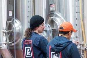 Workers at Lucky Envelope, where co-founder Barry Chan enjoys putting &ldquo;new, weird, and exciting ingredients in a beer to change the drinking experience.&rdquo; Courtesy Lucky Envelope Brewing
