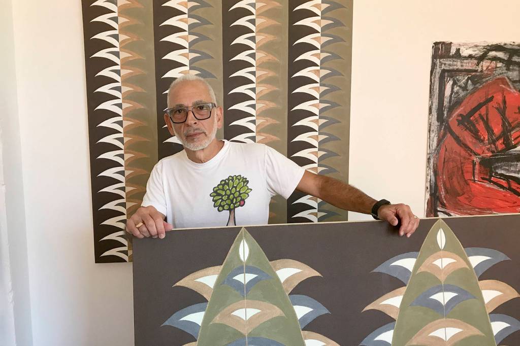 The artist and his work. Photo by Jason Simms