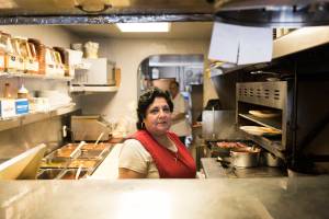 Julia Ramos says she thinks the influx of new businesses is a good thing for South Park, but knows that they will likely help price her out. Photo by Ted Zee