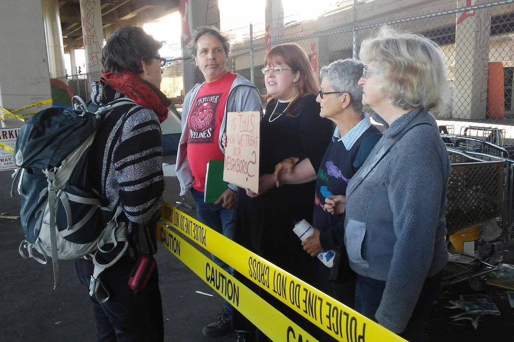 Activists protest the sweep. Photo courtesy Travis Thompson