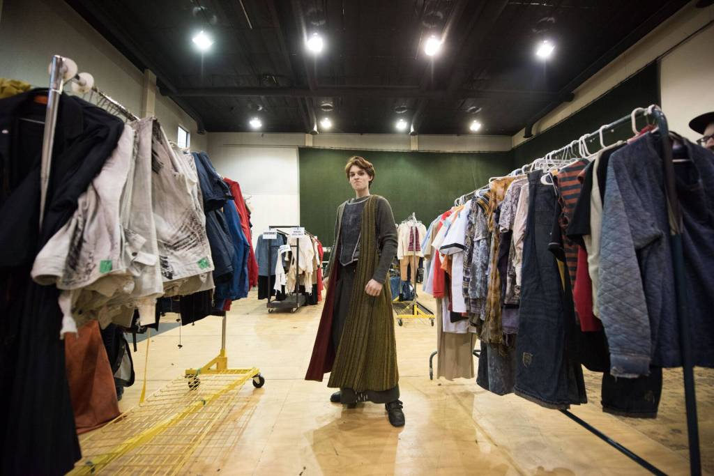Quinn Alexa Dailey tries on one of the Valkyrie costumes from Wagners Ring Cycle. Photo by Nate Watters