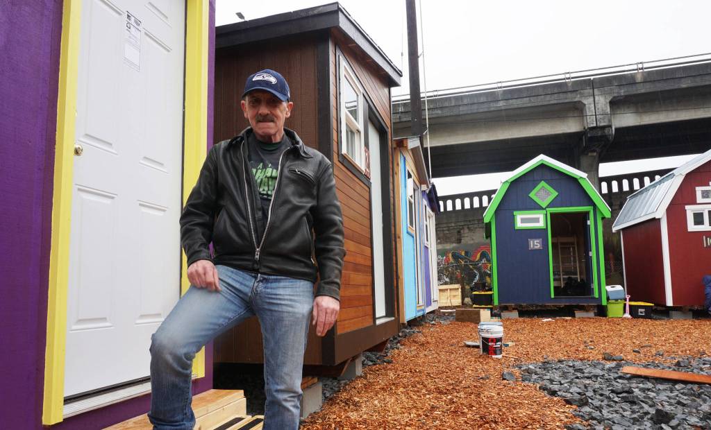 Jerry Ohmer, 61, started volunteering at tiny house villages after living in Othello Village for six months. Photo by Melissa Hellmann