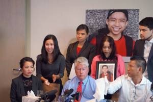 Tommy Les family, joined by their lawyers, held a press conference in September to discuss autopsy results that showed the Burien man was shot in the back. Photo by Daniel Person