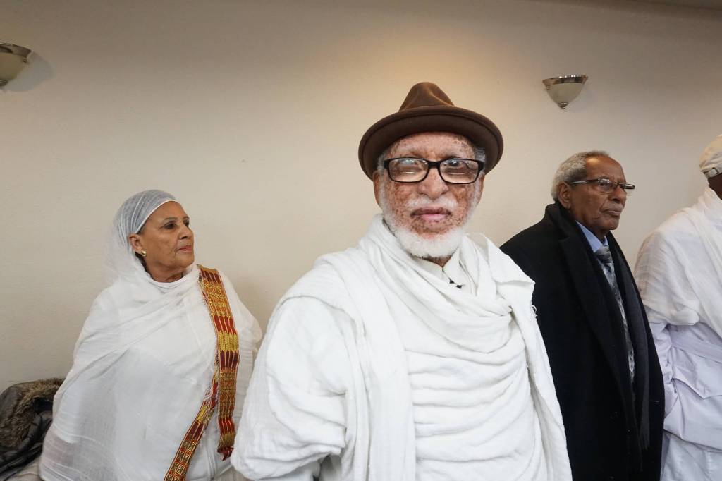 Asefa A. Tessema awaits Jenny Durkans speech at the Ethiopian community center Tuesday afternoon.