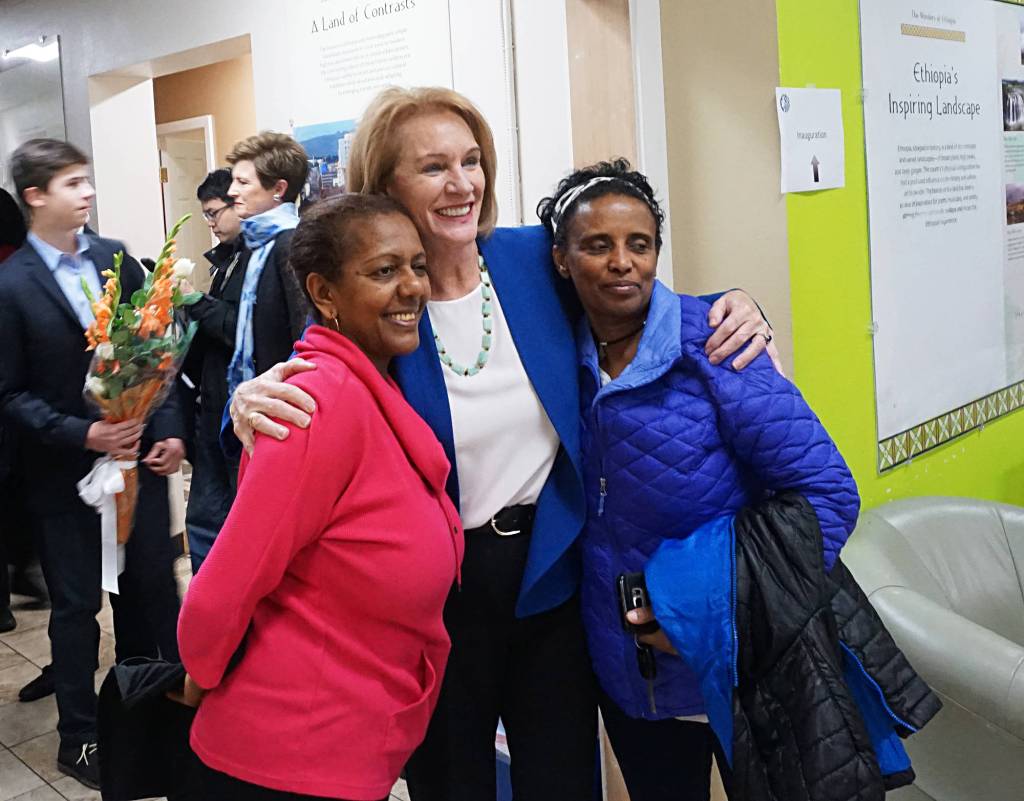 Mayor Jenny Durkan (center) embraces Menbe Tadesse (left) after her official swear-in at Rainier Beachs Ethiopian community center Tuesday. Photo by Melissa Hellmann