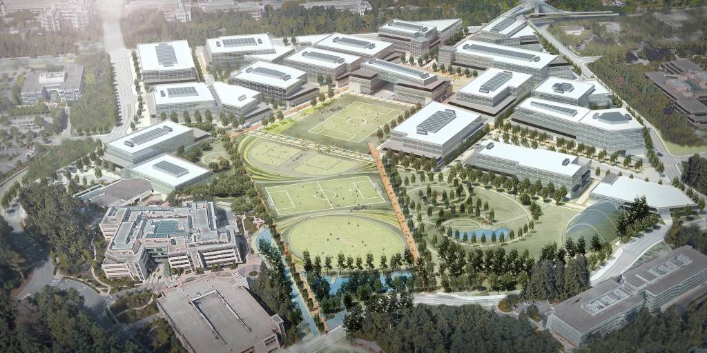 This artist rendering shows the Microsoft planned redevelopment, including the removal of 12 buildings and the construction of 18 new ones, along with open spaces and sports fields. Courtesy of Microsoft                                The updated Microsoft campus will feature 18 new buildings. Courtesy of Microsoft