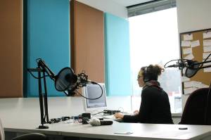 Seattleland host Sara Bernard stitches together the citys stories. Photo by Mark Baumgarten