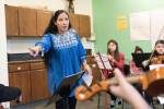 Paula Madrigal directs Young String Project Outreach students. Photo by Ted Zee