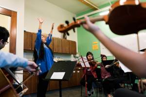 Paula Madrigal teaches young Latinx musicians via her Young String Project Outreach. Photo by Ted Zee