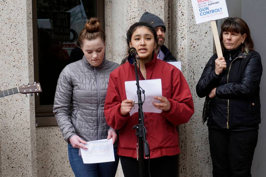March for Our Lives Seattle founders Emilia Allard (left) and Rhiannon Rasaretnam (right) spoke at a Seattle Indivisible anti-gun rally on March 13. Photo by Melissa Hellmann