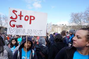 Students gathered at Seattle Center at the end of the March for Our Lives demonstration on March 24, 2018. Photo by Melissa Hellmann
