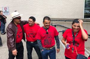 The Firs Homeowners Association celebrate outside of the Maleng Regional Justice Center after a ruling that buys them more time in their homes on June 7, 2018. Photo by Melissa Hellmann