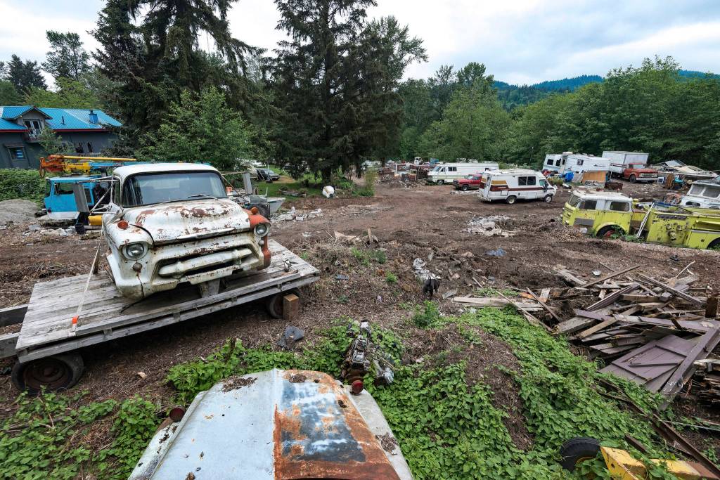 The 10 acre plot known as Iron Mountain is home to countless broken-down cars, boats, fire trucks, buses, 
and even a street sweeper. The sprawling junkyard encircles Pillons home. Photo by Caean Couto