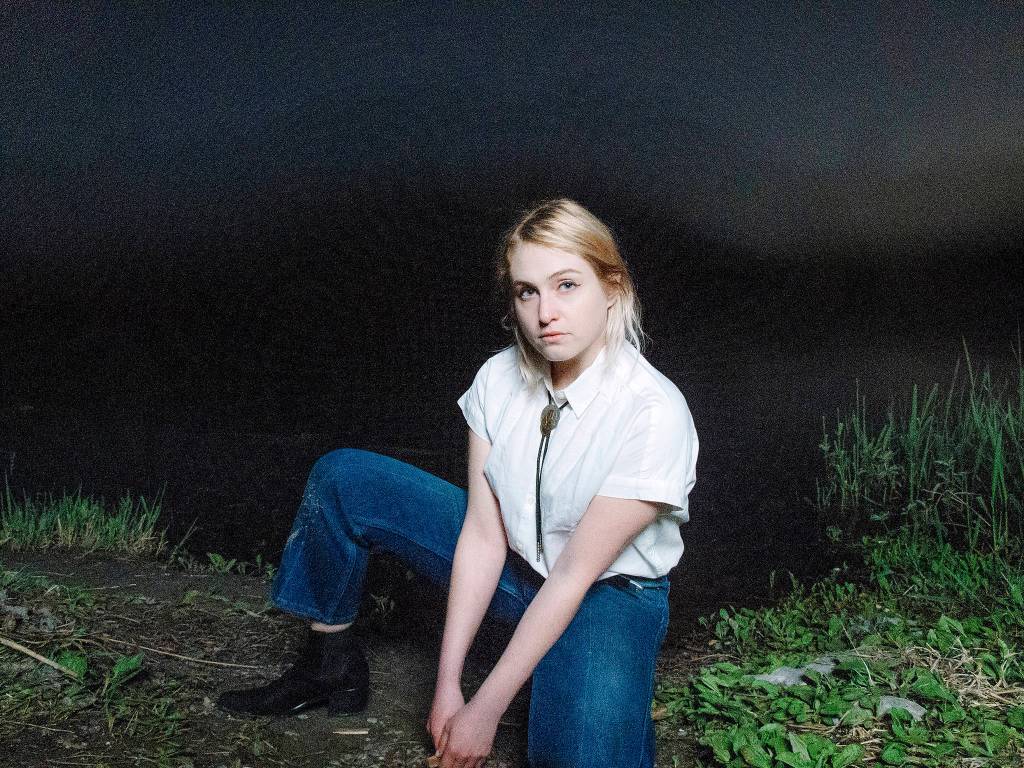 Whitney Ballen rests in dark places. Photo by Sofia Lee