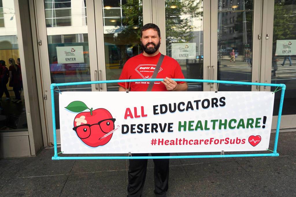 Toby de Luca is a full-time substitute teacher who wants guaranteed healthcare to be included in the contract. The school district cant function without substitutes, de Luca said. Photo by Melissa Hellmann