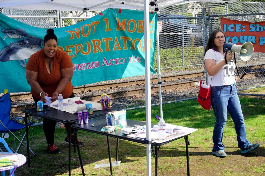 ShaCorrie Tunkara (left) and Maru Mora-Villalpando (right) at a NWDC Resistance demonstration outside of the NWDC on Sep. 1, 2018. Photo by Melissa Hellmann