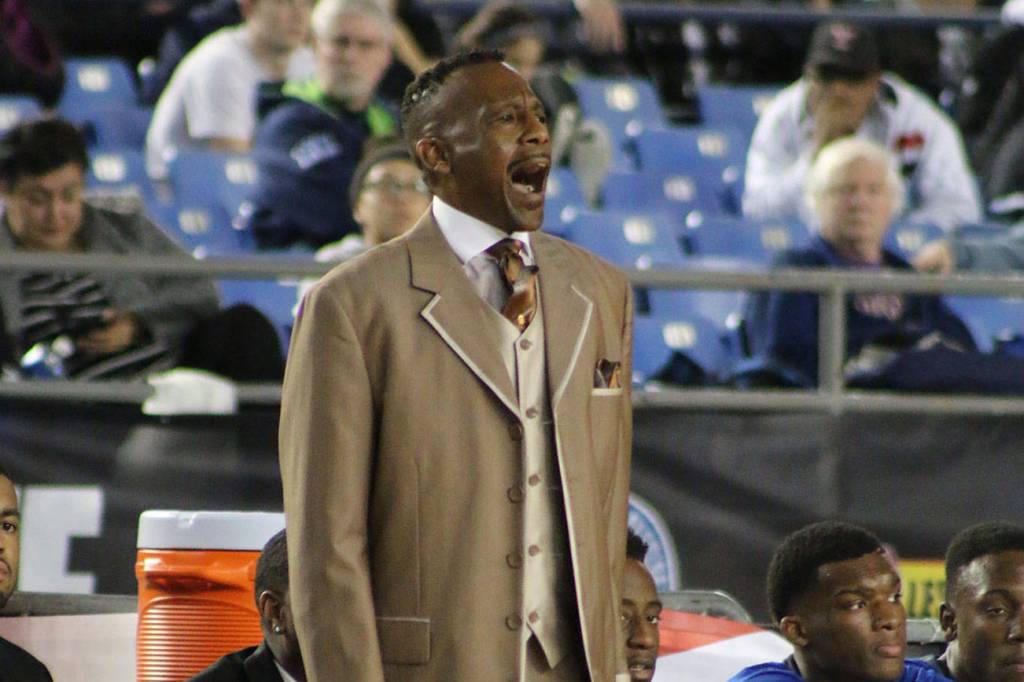 Longtime Federal Way High School basketball coach Jerome Collins reacts during the teams 2016 state championship game. File photo