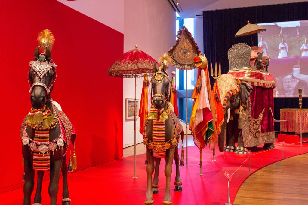 A wedding procession welcomes you to <em>Peacock in the Desert</em>. Photo by Natali Wiseman/Seattle Art Museum