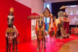 A wedding procession welcomes you to <em>Peacock in the Desert</em>. Photo by Natali Wiseman/Seattle Art Museum