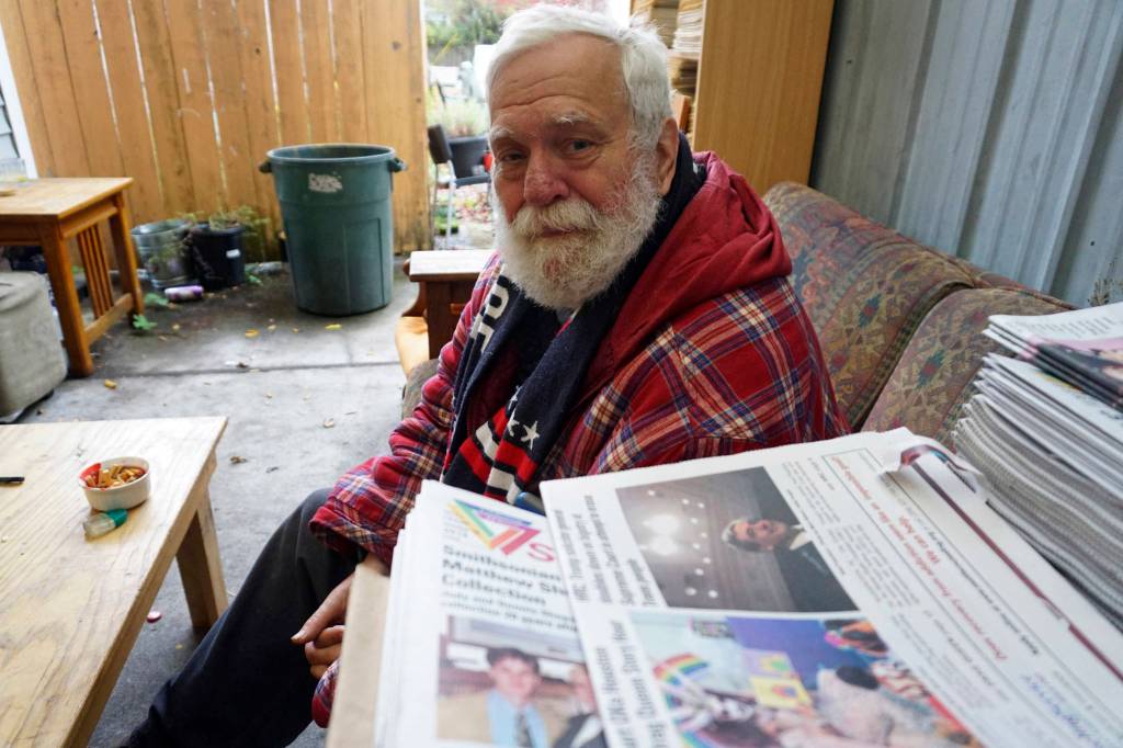 George Bakan, Seattle Gay News publisher and community activist, sits outside of his Capitol Hill office on Oct. 26. Photo by Melissa Hellmann