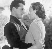 Love before wartime: Sean Penn and Kristin Scott Thomas at close quarters.