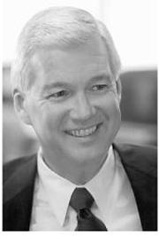 Oglesby smiles while fighting the newspaper war.