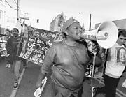 Stop the killings! Marchers demand police accountability.