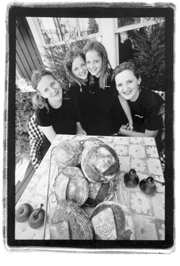 Chef Lasha Johnson, daughters Desiree and Danielle, and owner Laurie Dent.