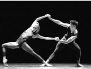 PNB's Melanie Skinner and Casey Herd in In the middle, somewhat elevated.